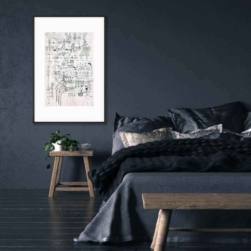 abstract line drawing in frame on wall above bed side table