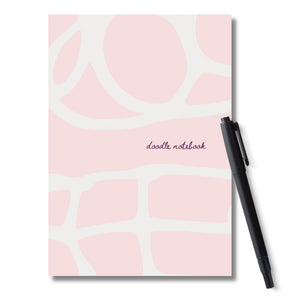 cover of notebook with light pink background and enlarged white doodle design with title that reads: doodle notebook