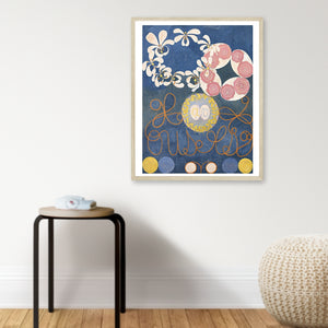 abstract art poster in mostly blue by artist Hilma af Klint hanging on wall above stool