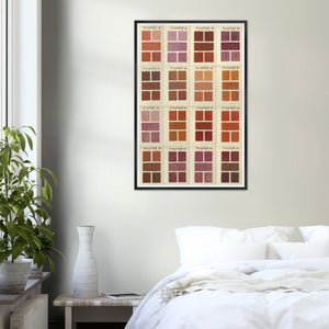 A. Boogert Reds, pinks, and oranges color swatches in an art print framed on wall in bedroom