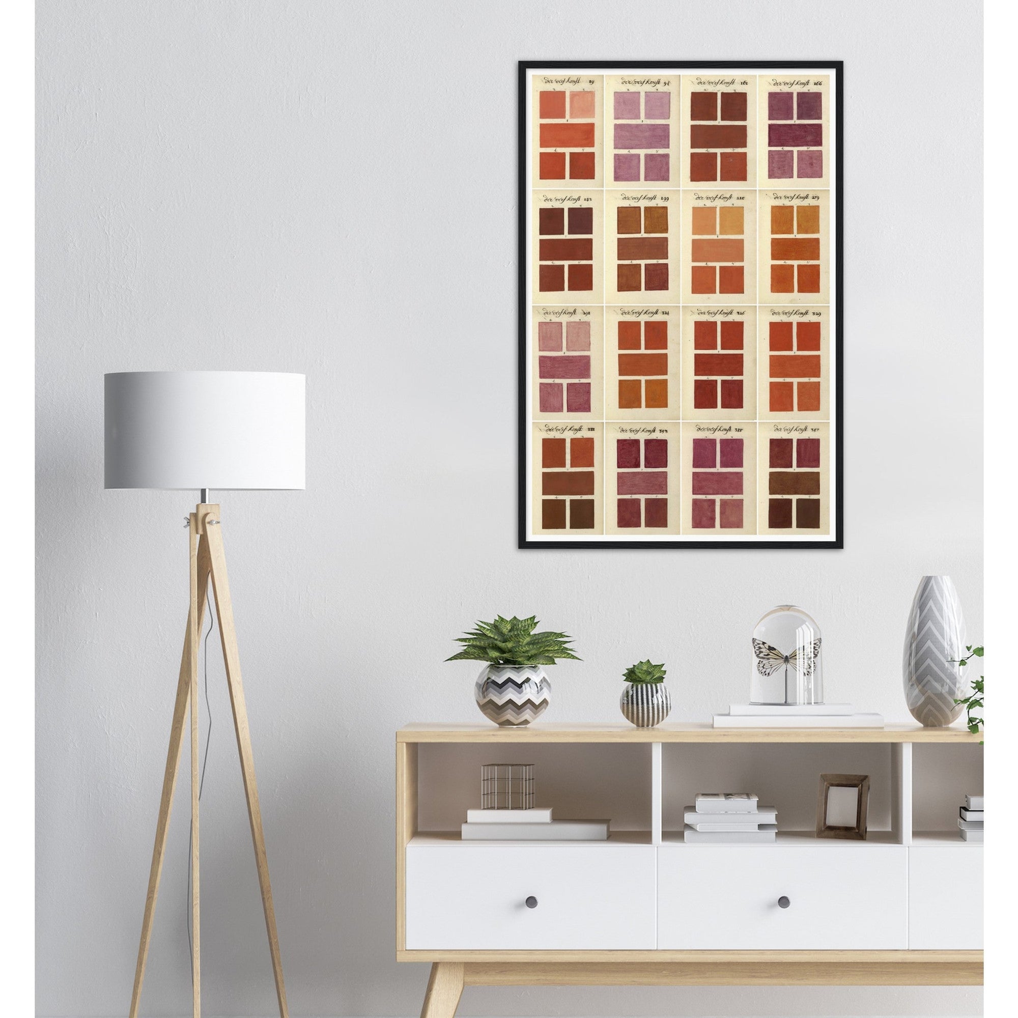 A. Boogert Red/Oranges color swatches in large art print framed on wall above shelf